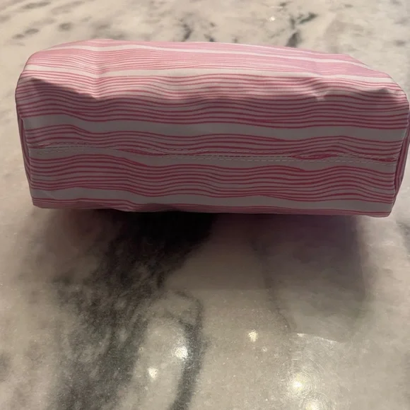 SCOUT Packin' Heat Makeup Bag featuring a pink and white wavy stripe pattern. - Picture 9 of 15